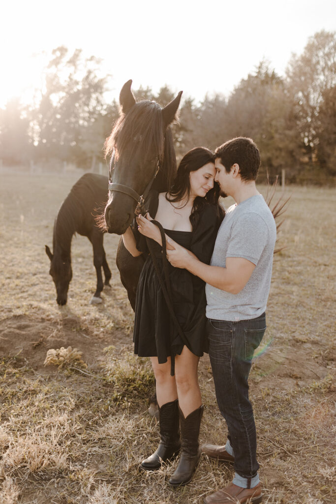 Engagement photography with horses on farm outside of Lincoln Nebraska 