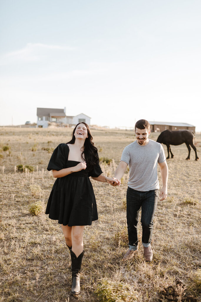 Engagement photo session on farm outside of Lincoln, Nebraska with horses. 