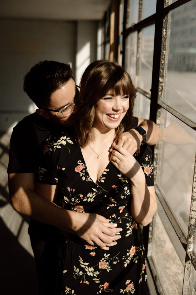 engagement pictures at parking garage in downtown lincoln nebraska