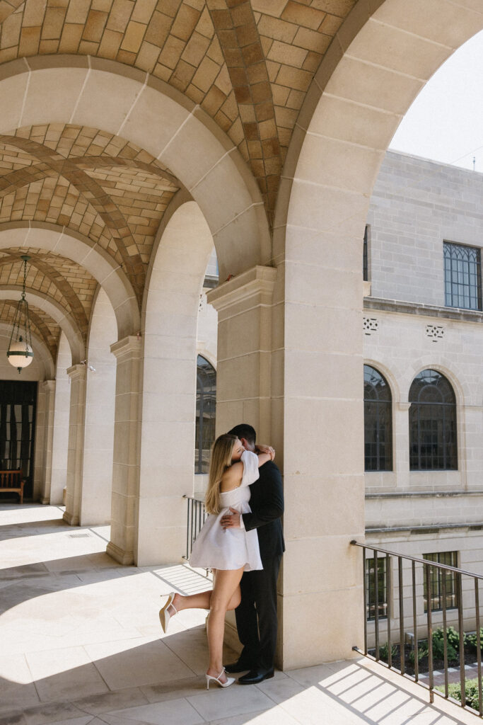 on the balcony of the nebraska state capitol building 