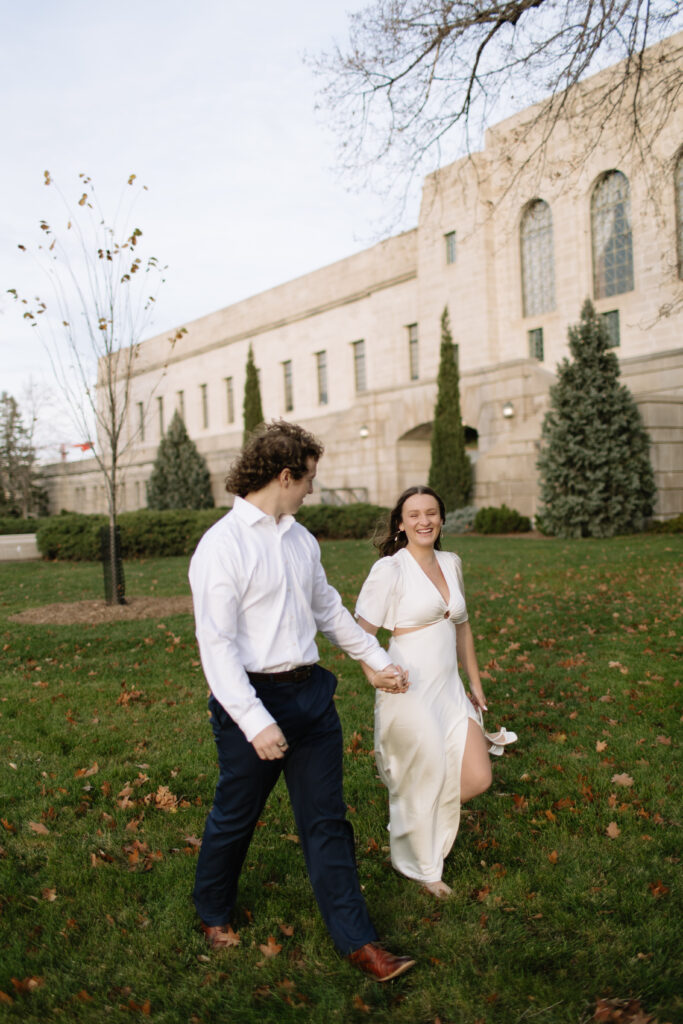 outdoor engagement photos at the Nebraska state capitol building downtown lincoln 