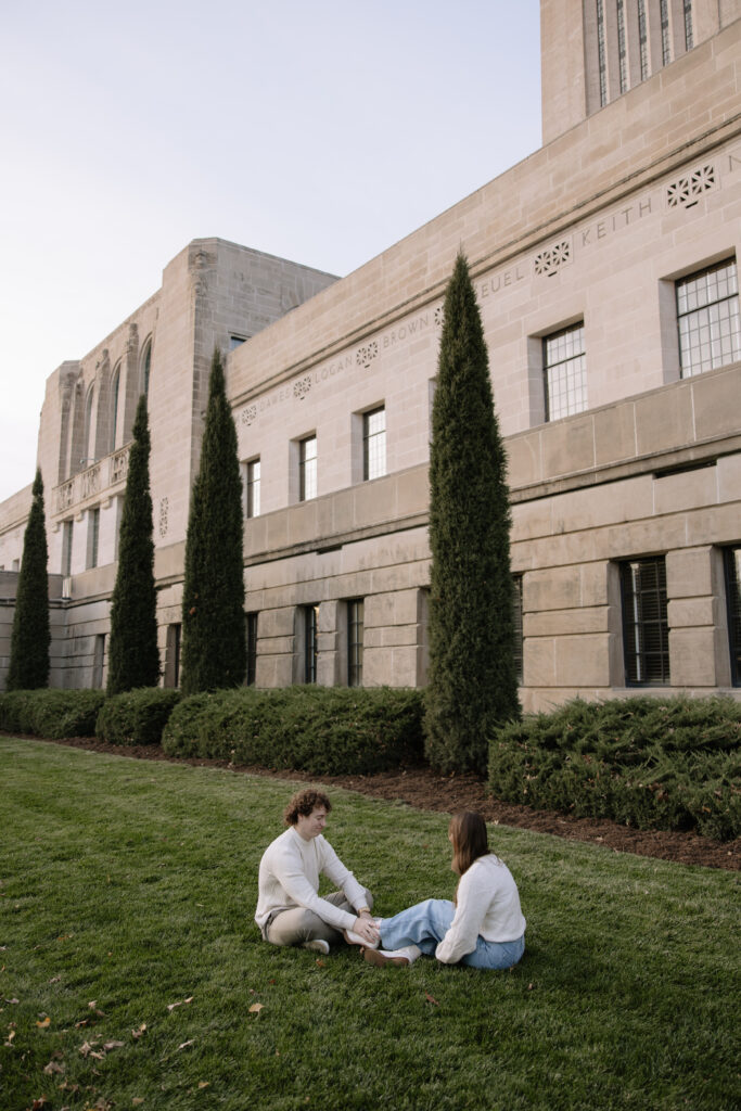 outdoor engagement photos at the Nebraska state capitol building downtown lincoln 