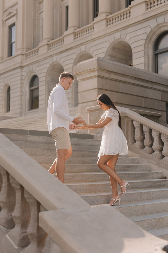 Omaha Nebraska Engagement Pictures outside of Central High School Downtown 