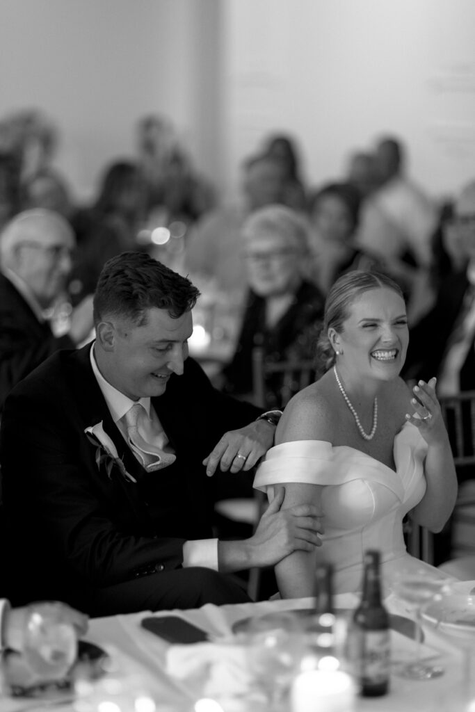black and white photo of Paige and Dahn at their wedding reception 