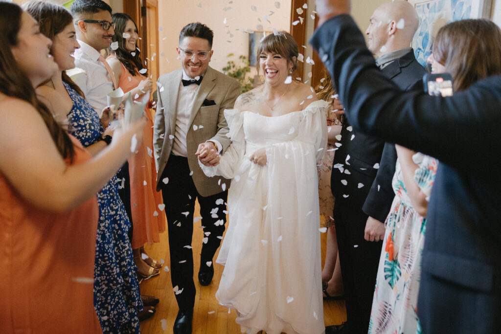 Kevin and Becca enter their reception as husband and wife. 
