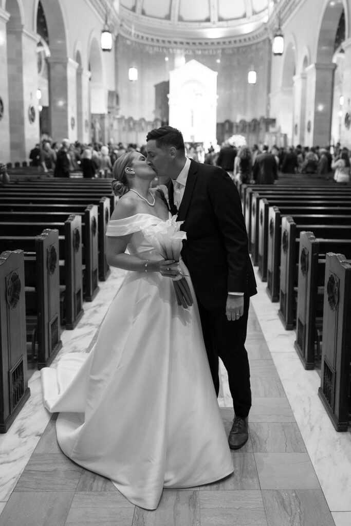 first kisss at the end of the aisle