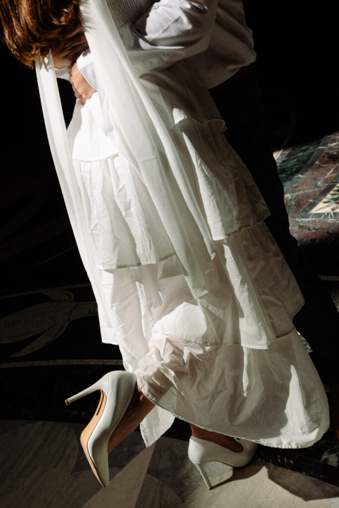 A long white dress is a perfect outfit for engagement photos 