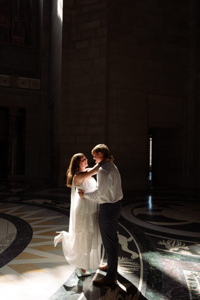 couple poses for engagement photo 
