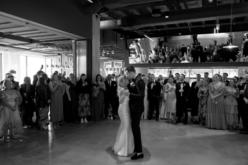 first dance surrounded by family and friends at well planned wedding reception 