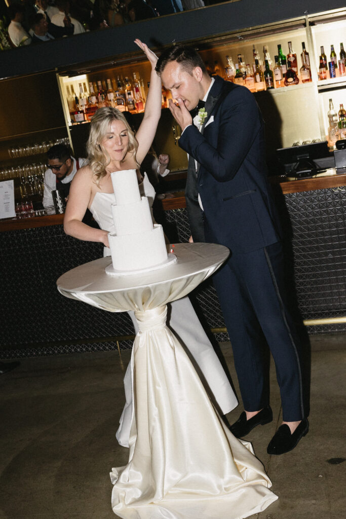beautifully planned and executed cake cutting at wedding reception 
