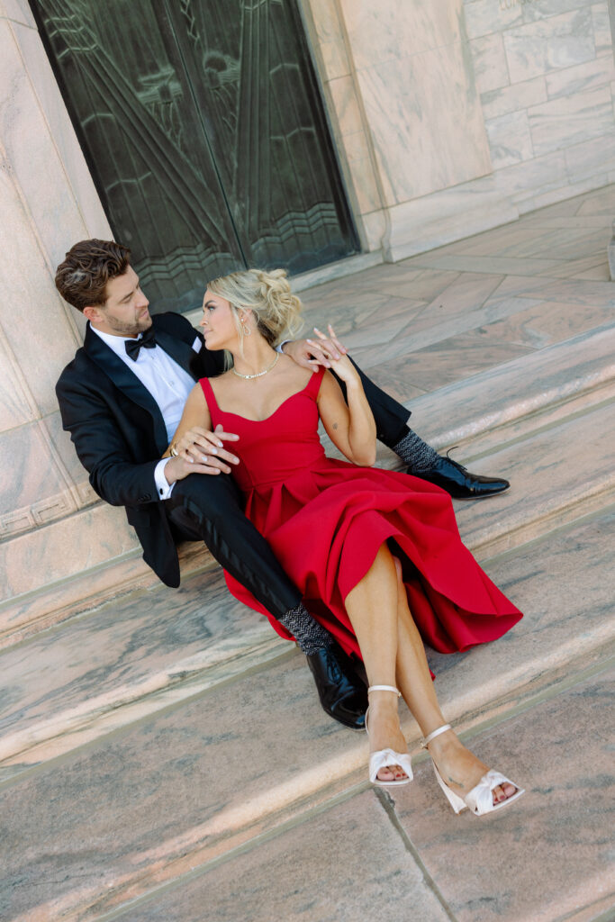 outdoor engagement photo on the steps of the joslyn art museum 