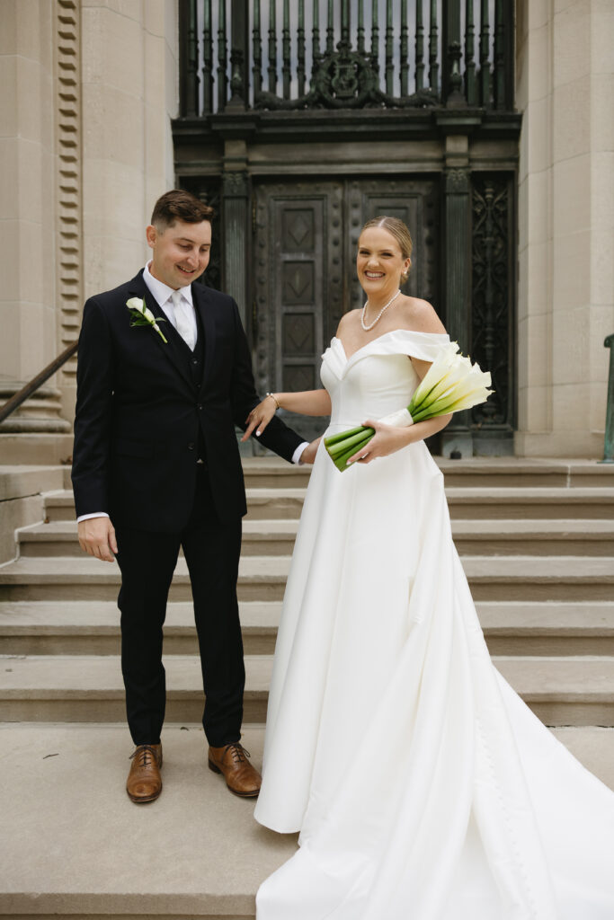 portraits of the bride and groom outside of the cathedral 
