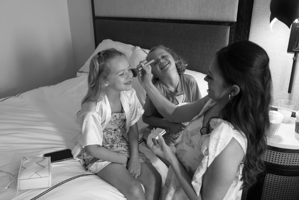 flower girls getting ready for empire room wedding at the cottonwood 