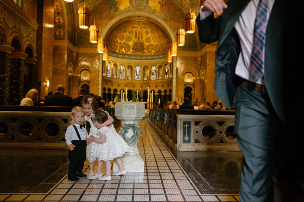 children get ready for the ceremony at Saint Clement in Chicago