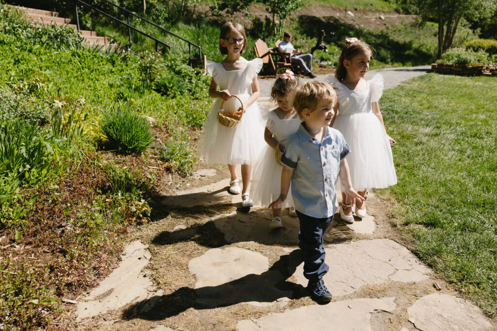 flower children in outdoor ceremony 