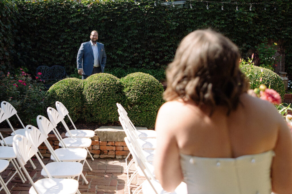Bride and groom first look before their intimate wedding at Lucile's Old Market 