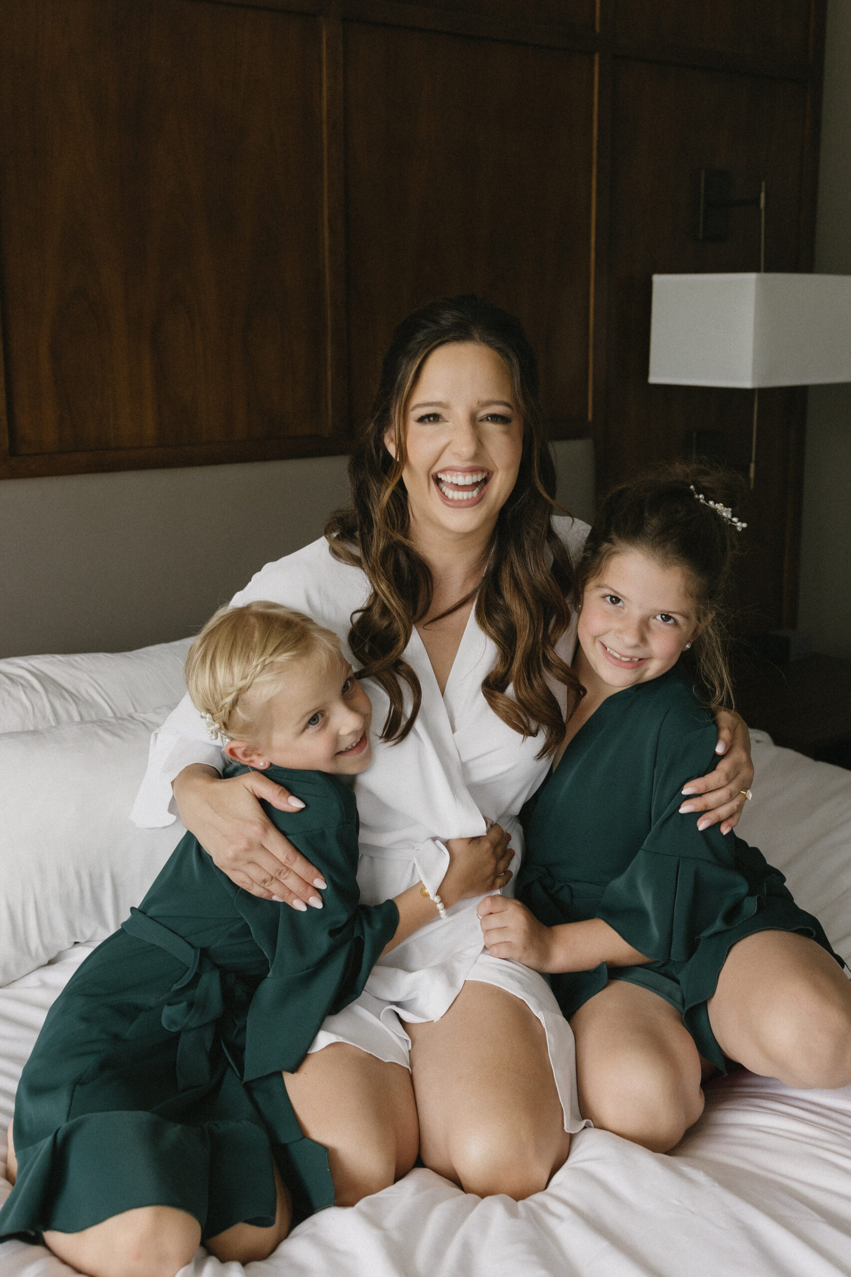 flower girls getting ready with bride
