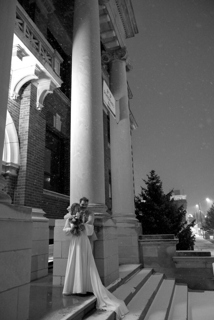 black and white winter wedding portraits in the snow 