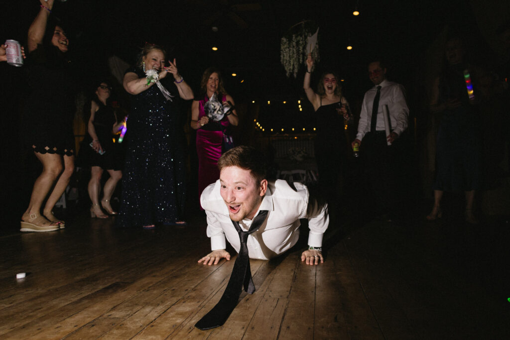 Groom Dances at his Wedding Reception at the Vintage Ballroom 