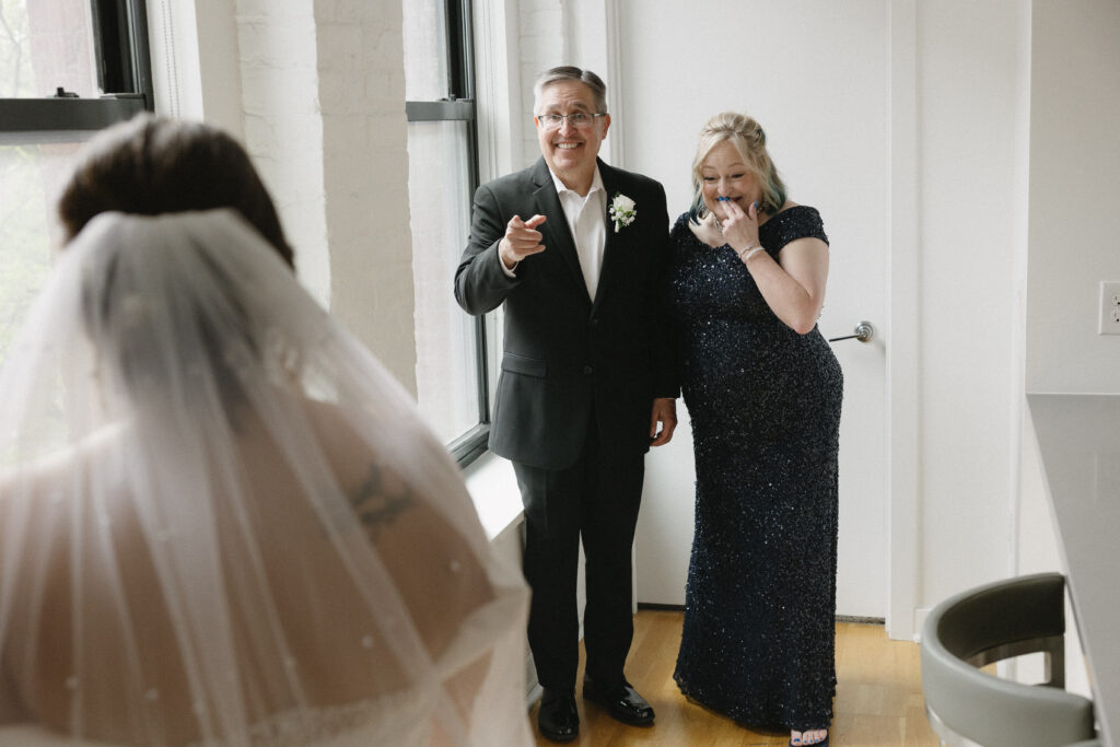 first look with the bride and her parents 